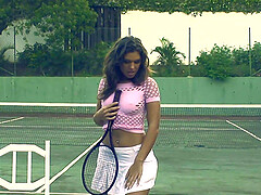 Beautiful solo brunette pleasuring her cunt on a tennis court