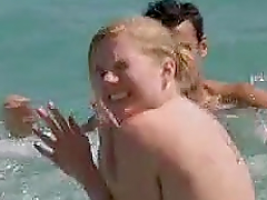 Sexy Eva Birthistle Wearing a Bikini on a Beach - 'A Fond Kiss' Scene