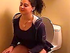 Sexy Turkish girl is taking shit on a hidden camera
