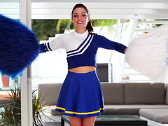 Stunning Gigi Marie poses in cheerleader uniform
