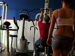 A dude tries to pick up sporty cutie Roxy Lane in a gym