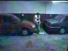 Horny Couple Fucking In The PArking Lot In Voyeur Vid