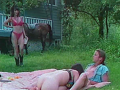 Damsel in thong refining huge dick with blowjob outdoor