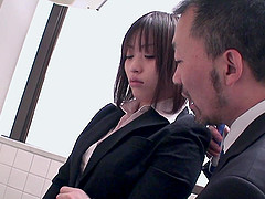 Brunette Asian in the bathroom gets groped by a businessman