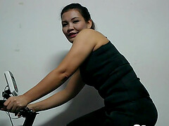 As she was done riding the indoor bicycle, she gave her boyfriend a blowjob