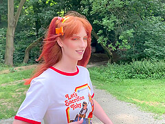 Redhead teen Alex Harper with pigtails does a photoshoot in the woods