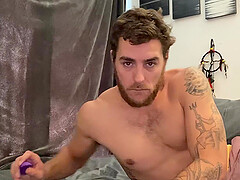 Gay dude films himself while he pokes his butt and masturbates