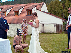 A hot bride is getting fucked outdoors by her husband in a steamy scene