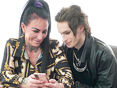 Inked Mature With Big Tits Gives Blowjob To Emo Stud