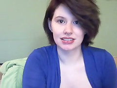 Pierced brunette shows her big natural tits and masturbates