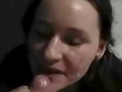 Horny brunette licks hard cock at home