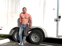 Muscle men meet up at a truck station and have hardcore gay sex