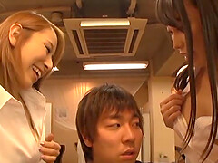 One guy gets his stiff dick pleasure by two Japanese hotties